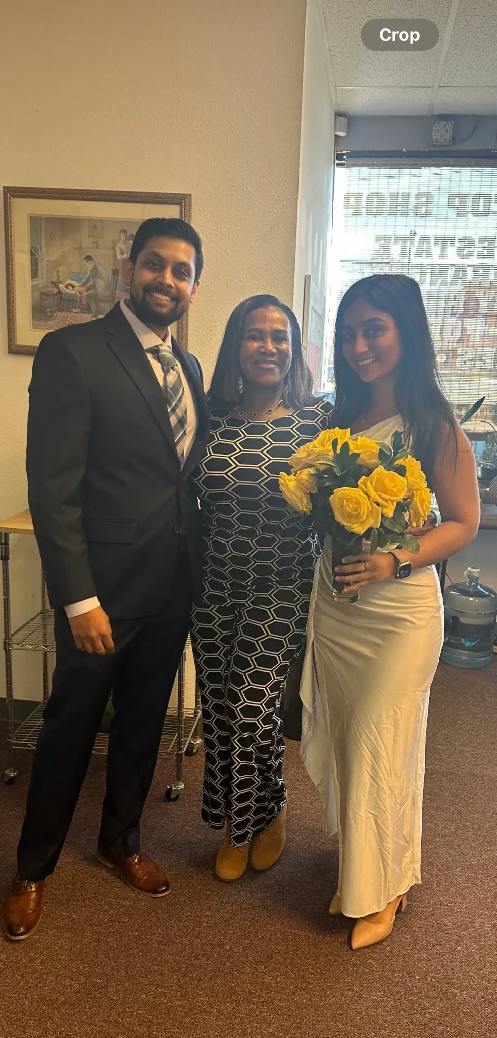 Couple exchanging rings in a garden ceremony